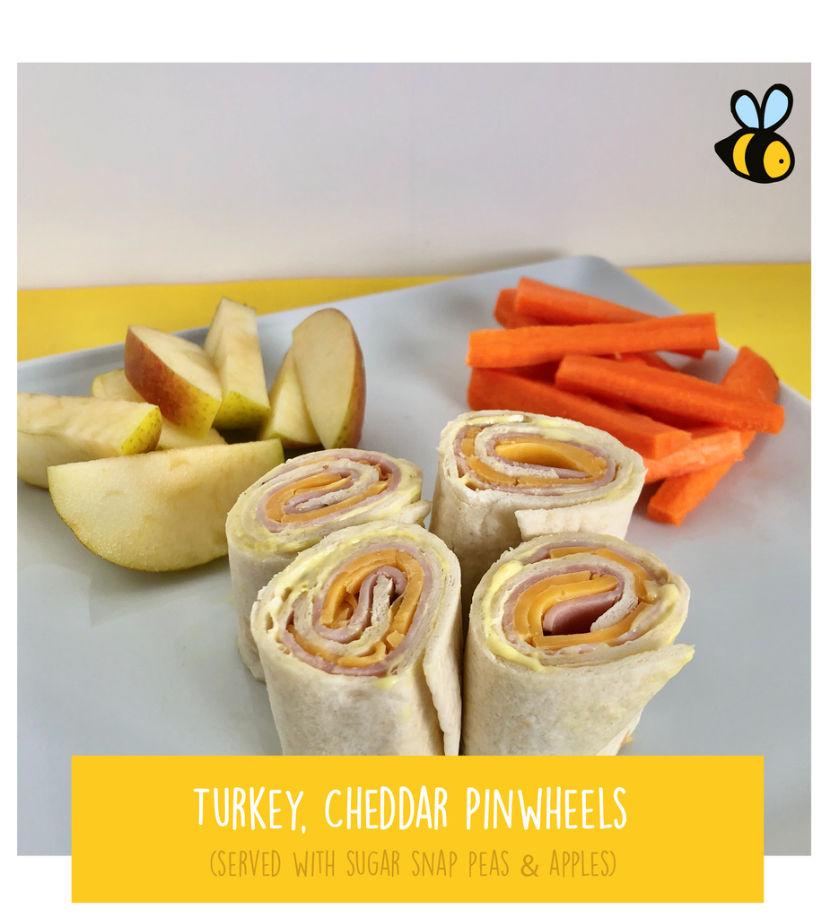Turkey and Cheese Pinwheels (served with carrots & apples)